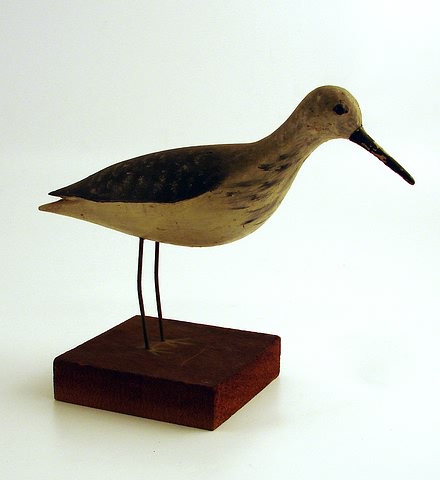 Appraisal: Yellowlegs shorebird decoy with legs attached to wooden base attributed