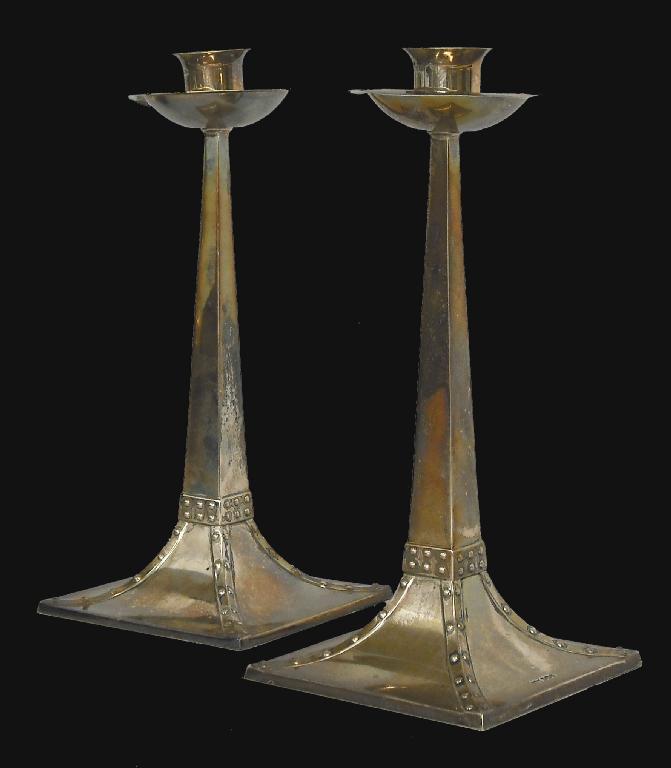 Appraisal: Pair of Mappin Webb silver candlesticks in the Arts Crafts