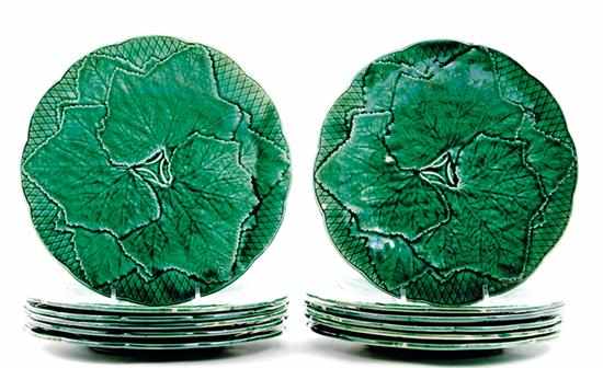 Appraisal: French faience plate set green glaze begonia leaf pattern marked