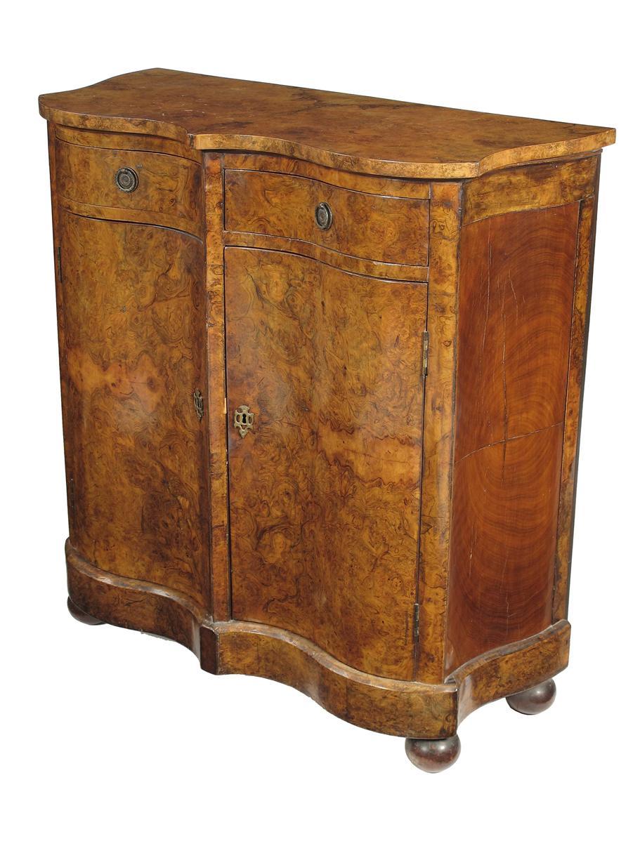 Appraisal: A Victorian burr walnut side cabinet of arc darbelet form