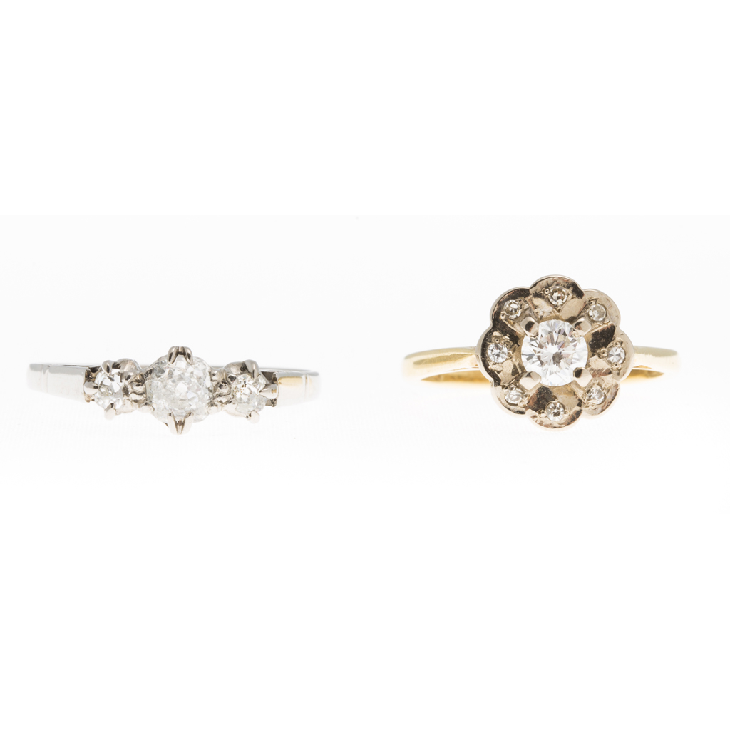 Appraisal: A diamond set cluster ring the central round cut diamond