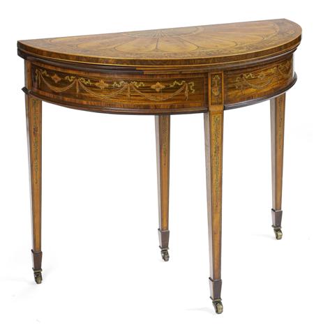 Appraisal: A George III style satinwood tulipwood harewood and marquetry foldover