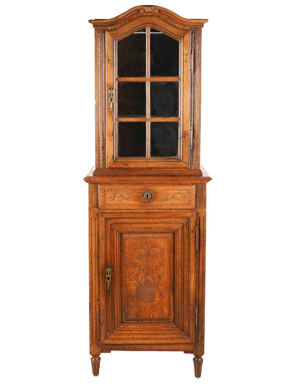 Appraisal: FRENCH PROVINCIAL OAK CABINETthe top having a hinged door with