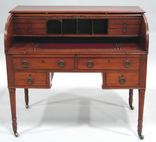 Appraisal: Mahogany tambour top opening to a fitted interior with pigeon