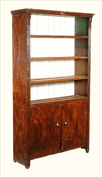 Appraisal: A grained pine open three-shelf bookcase late th century with