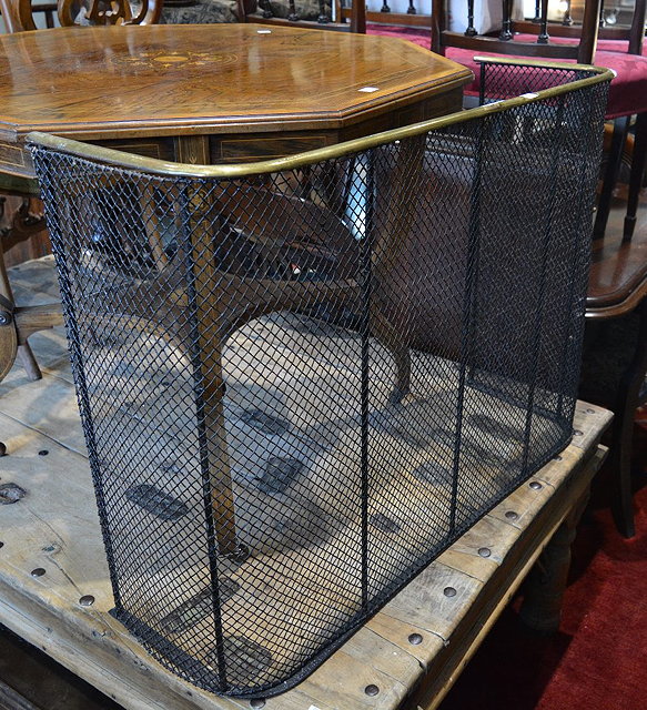 Appraisal: A Victorian brass and wire mesh nursery fire guard cm