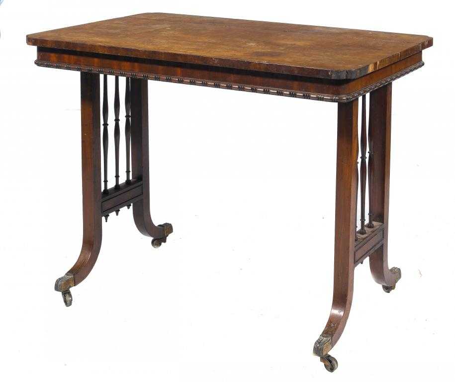 Appraisal: A REGENCY MAHOGANY WRITING TABLE the oblong top with re-entrant