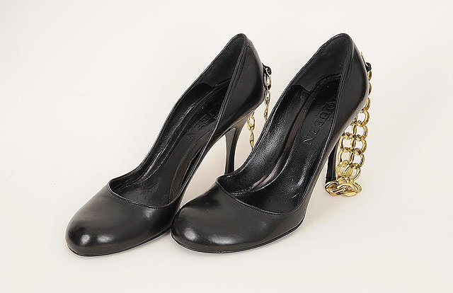 Appraisal: A pair of black Alexander McQueen high heeled shoes with