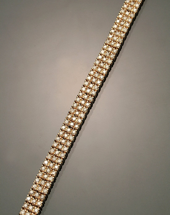 Appraisal: -Karat Yellow-Gold and Diamond Flexible Bracelet Set with two hundred