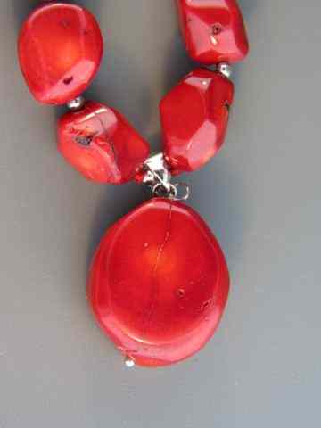 Appraisal: Coral Necklace nugget style beads with pendant '' long sterling