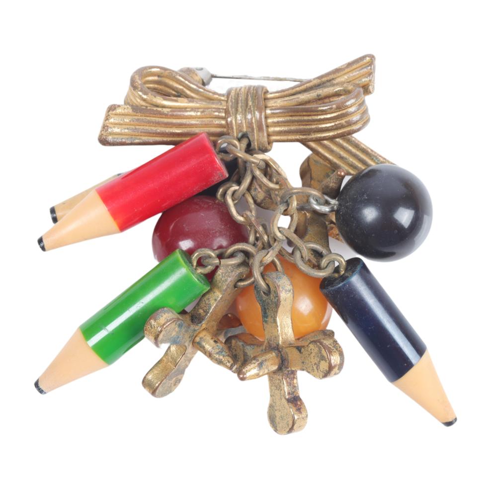 Appraisal: SCHOOLHOUSE PIN WITH BAKELITE PENCILS BALLS AND METAL JACKS H