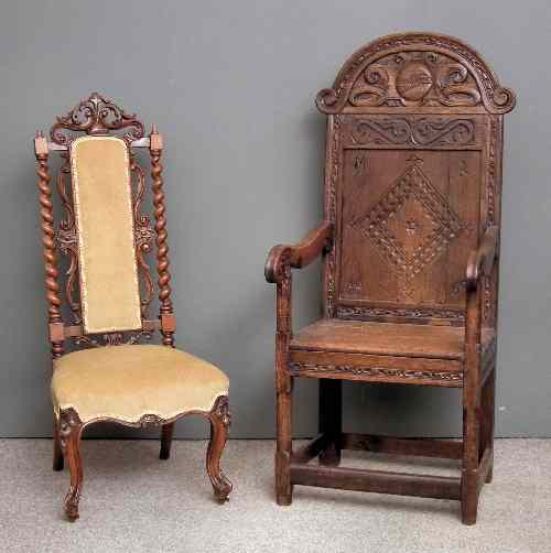 Appraisal: A th Century oak high back armchair with later arched