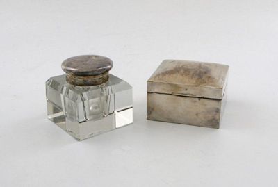 Appraisal: A silver mounted inkwell of square form plain hinged cover