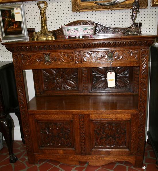 Appraisal: Continental carved oak buffet th century arched backsplash over rectangular