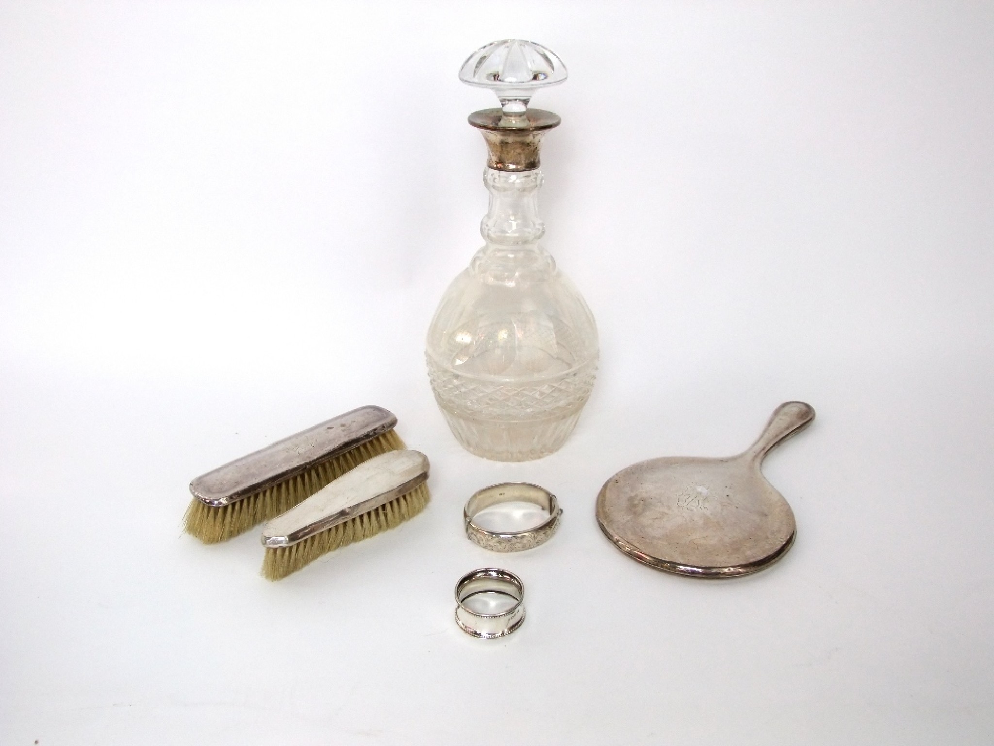 Appraisal: A heavy cut glass decanter with silver collar and mushroom