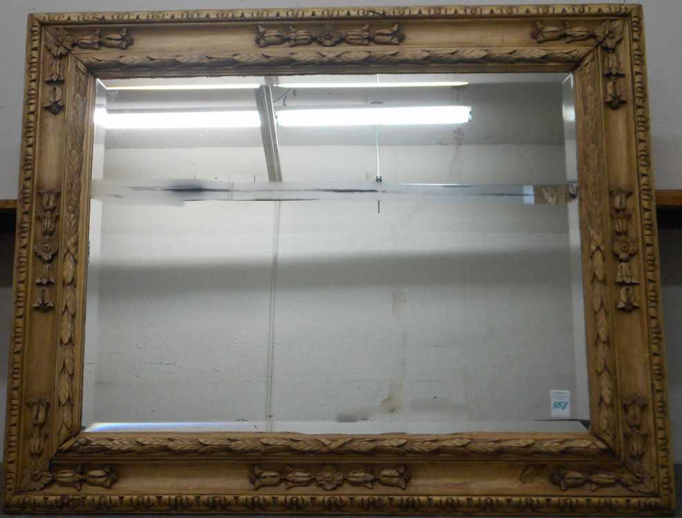 Appraisal: LARGE WALL MIRROR a rectangular beveled mirror in carved pine