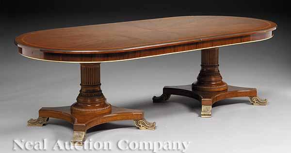 Appraisal: An Empire-Style Bronze-Mounted Inlaid Mahogany Dining Table the oval top