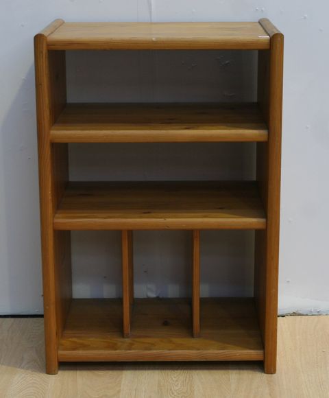 Appraisal: A stained pine bookshelf cm wide cm deep cm tall