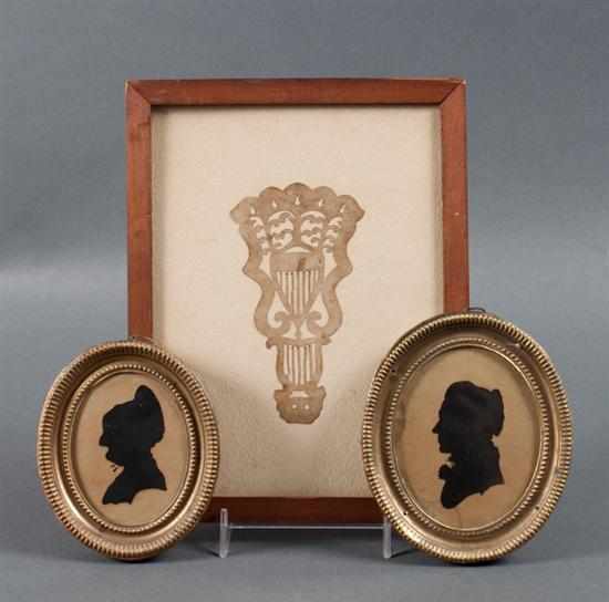 Appraisal: Pair of American ink on paper oval silhouettes and a