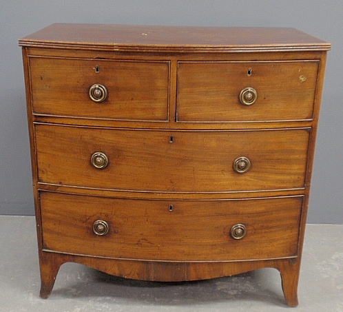 Appraisal: - Georgian mahogany bow-front chest of drawers c with flaring