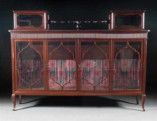 Appraisal: Edwardian mahogany glazed panel bookcase first quarter- th century with