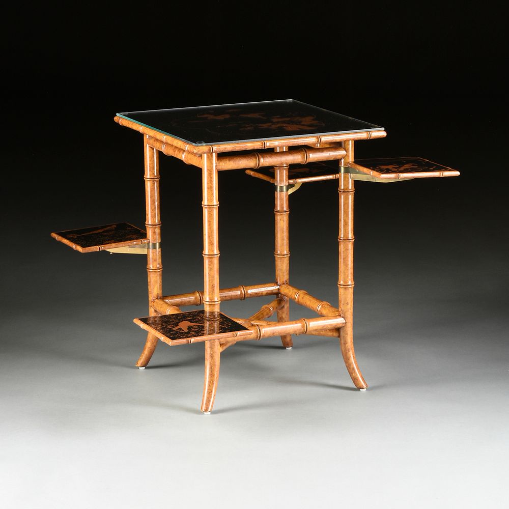 Appraisal: A JAPANESE STYLE BLACK LACQUERED AND FAUX BAMBOO SIDE TABLE