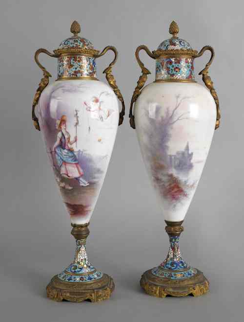 Appraisal: Pair of Sevres type porcelain urns th c with cloisonn