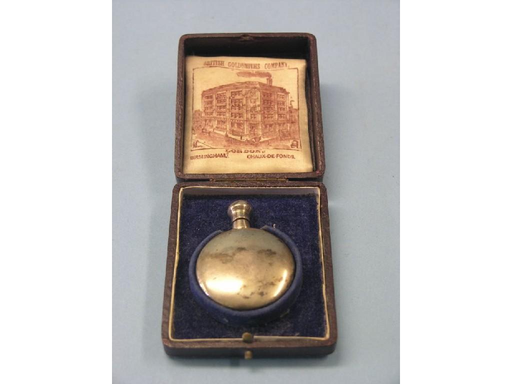 Appraisal: A silver scent bottle circular-shape with screw cover Birmingham contained