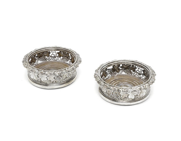 Appraisal: A pair of George IV silver wine coasters by Smith