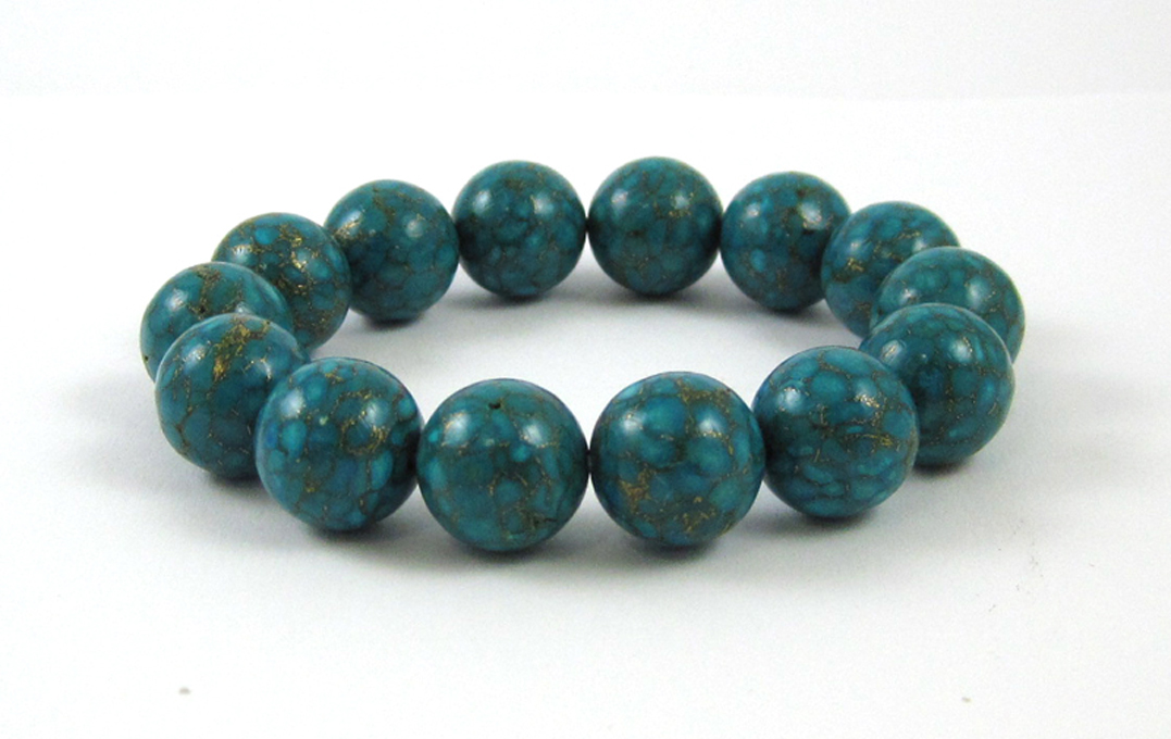 Appraisal: TURQUOISE STRETCH BRACELET with round natural turquoise beads each measuring