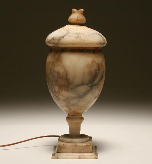 Appraisal: Alabaster lamp of lidded urn form carved florals throughout H