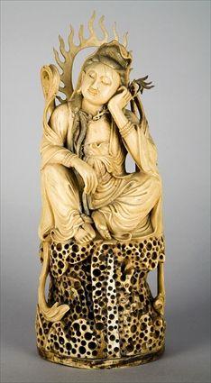 Appraisal: CHINESE CARVED IVORY FIGURE OF BUDDHA Presented seated on porous