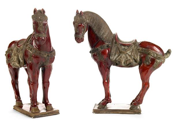 Appraisal: A pair of Tang style red-glazed earthenware figures of horses