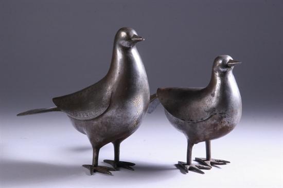 Appraisal: TWO QAJAR STEEL FIGURES OF PIGEONS th century Decorated in