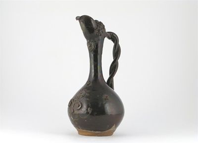 Appraisal: A brown glaze Channakale ewer applied with florets th th