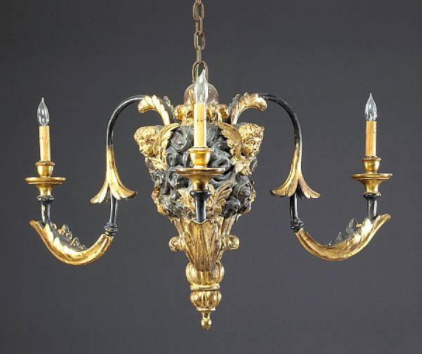 Appraisal: A pair of Italian Baroque carved parcel gilt and paint