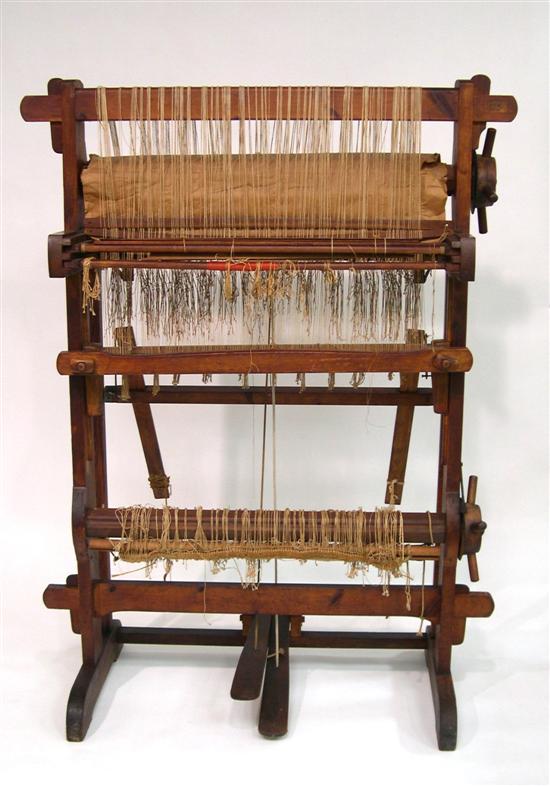 Appraisal: Foot-treadle weaving loom made of stained wood and metal components