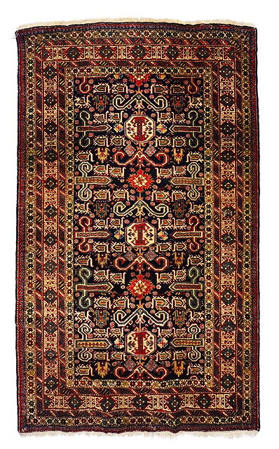 Appraisal: A CAUCASIAN PEREPEDIL DARK BLUE GROUND RUG with a repeating