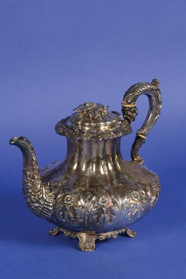 Appraisal: A GEORGE IV IRISH TEA COFFEE POT of melon form