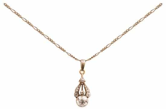 Appraisal: AN EDWARDIAN DIAMOND PENDANT Featuring an old European cut diamond