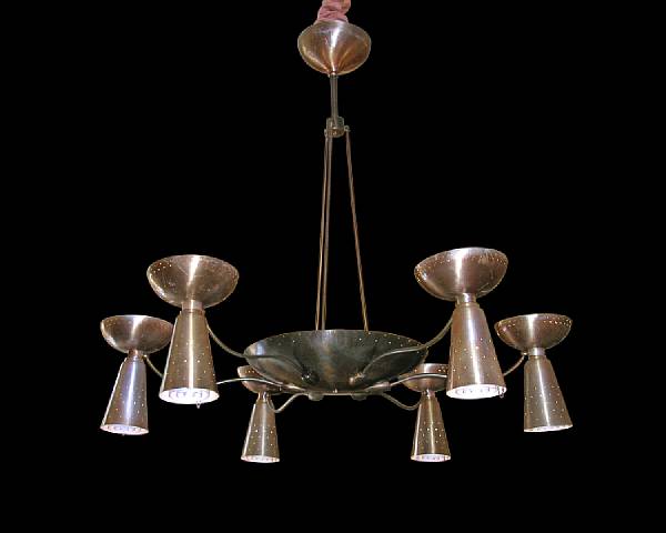 Appraisal: A monumental American pierced and painted brass six light chandelier