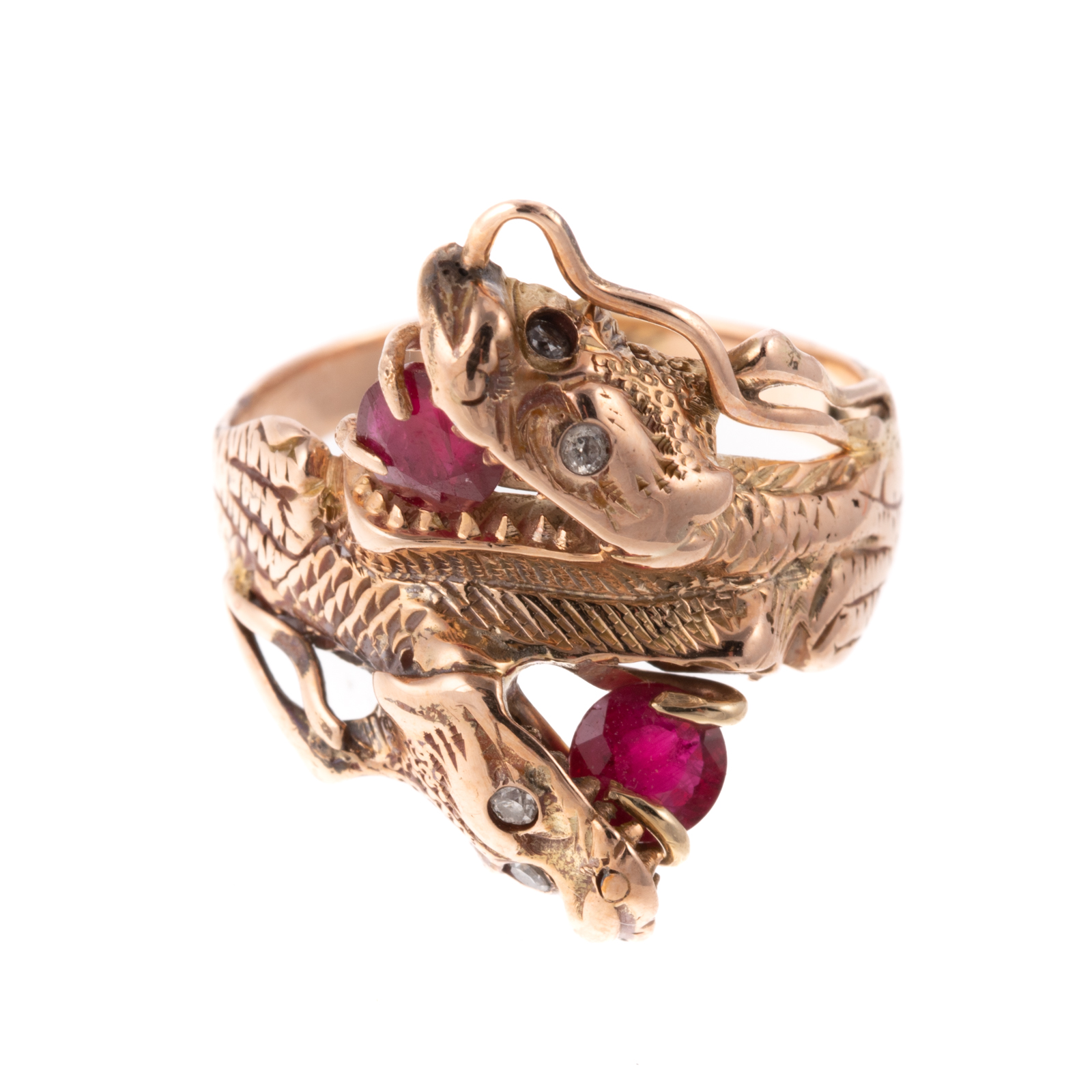 Appraisal: A DOUBLE-HEADED DRAGON RUBY RING IN K K yellow gold