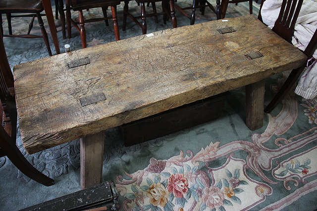 Appraisal: A TH CENTURY ELM PIG BENCH the rectangular plank top