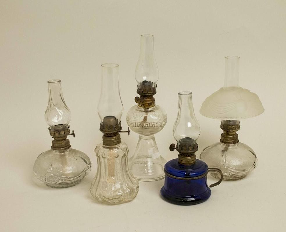 Appraisal: Five Assorted Oil Lamps Five assorted glass oil lamps clear