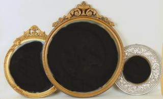 Appraisal: Three Decorative Mirrors Three decorative mirrors a Renaissance style repousse