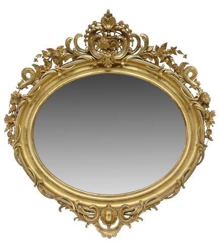 Appraisal: French Louis XVI style oval giltwood mirror openwork crest with