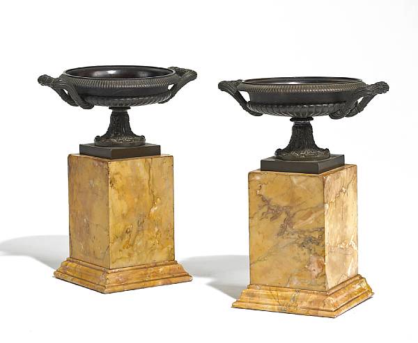 Appraisal: A pair of Charles X patinated bronze and sienna marble