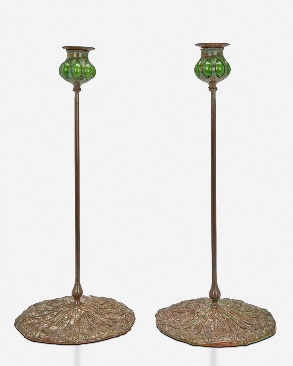 Appraisal: A pair of Tiffany-style candlesticks th Century Each spuriously signed