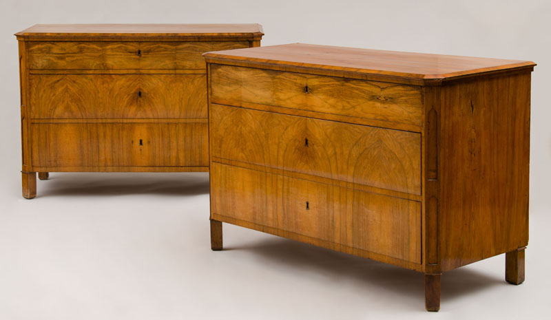 Appraisal: PAIR OF CONTINENTAL NEOCLASSICAL BLACK WALNUT COMMODES Each with a