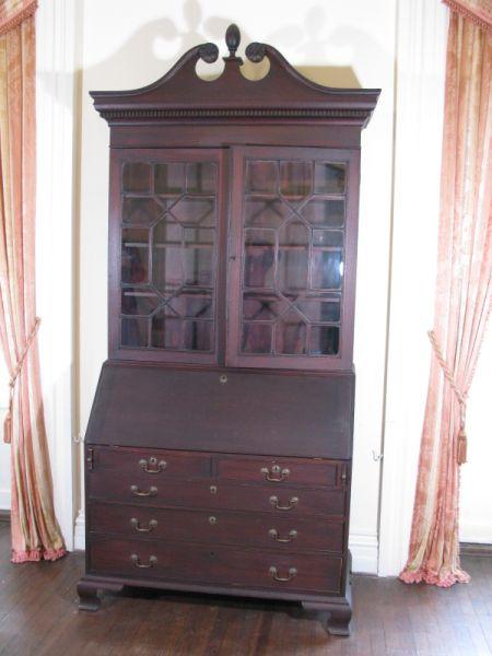 Appraisal: Chippendale Style Secretary Bookcase mahogany custom-made traditional form with broken